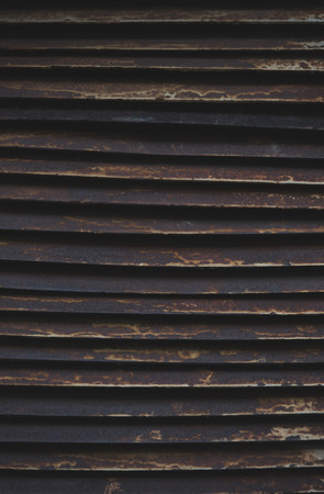 close-up view of old black rusty grid textureの写真素材