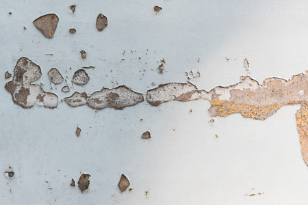 close-up view of old scratched rough weathered wall texture の写真素材