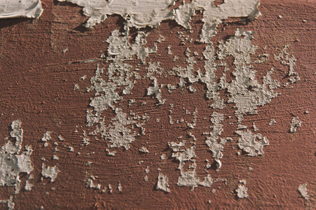 close-up view of old weathered background with cracked paintの写真素材