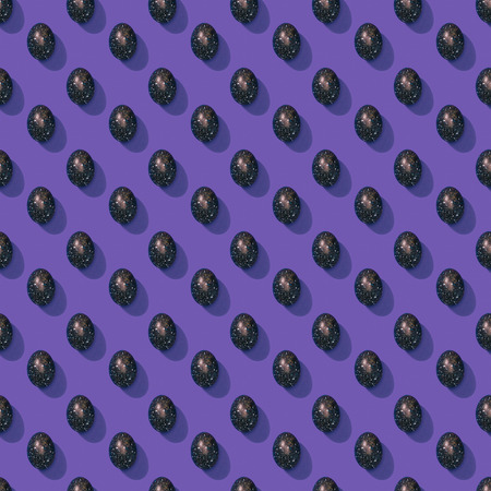 set of painted easter eggs on purpleの写真素材