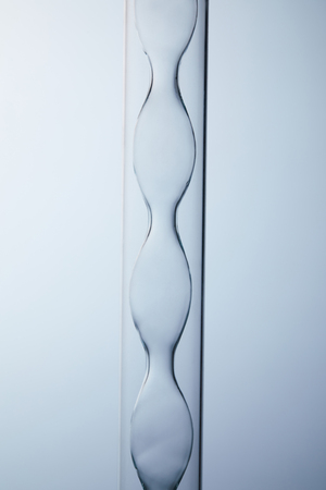 close-up shot of chemistry glassware on greyの写真素材