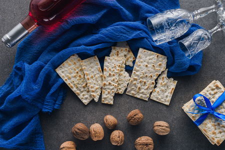 top view of matza, wine and walnuts on table, jewish Passover holiday conceptの写真素材
