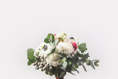 close up view of beautiful bridal bouquet isolated on greyの写真素材
