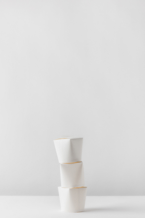three take away boxes on each other on white tableの写真素材
