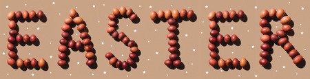 top view of word Easter made on painted chicken eggsの写真素材