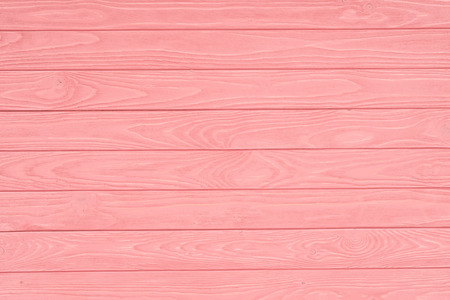Wooden fence planks background painted in pinkの写真素材