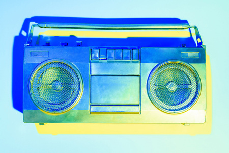 blue toned picture of retro boombox on blue background の写真素材