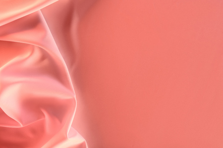 close up view of elegant pink silky fabric as backgroundの写真素材