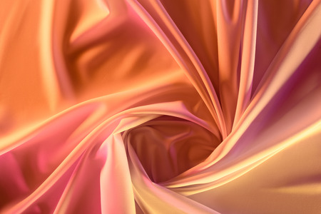 close up view of elegant pink silky fabric as backgroundの写真素材