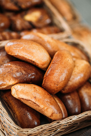 close up view of freshly baked pastry in basketの写真素材