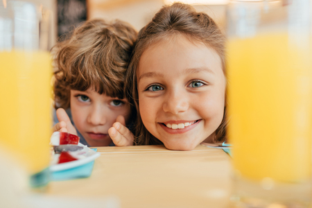 portrait of funny little kids looking at cameraの写真素材