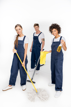 group of multiethnic cleaners working together isolated on whiteの写真素材