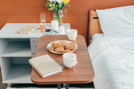 close-up view of cookies and book on table in hospital room