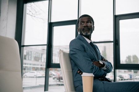 Middle aged African american businessman waiting at airportの写真素材