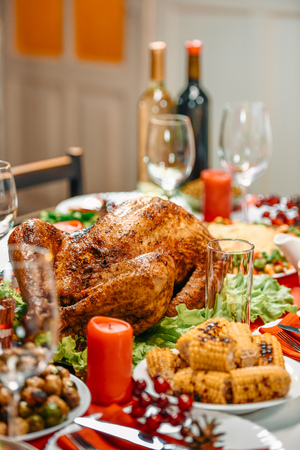 served table with delicious dishes for christmas dinnerの写真素材