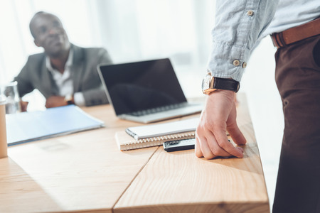 cropped image of multicultural businessmen in office