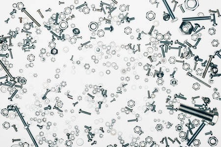 full frame of arranged various metal engineering details isolated on whiteの写真素材