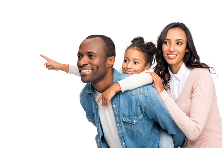 happy african american family looking away isolated on whiteの写真素材