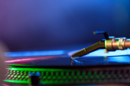 close up view of sound mixer with vinyl in nightclubの写真素材