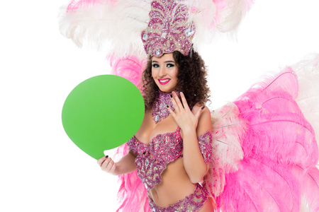 woman in carnival costume holding blank green text balloon, isolated on white