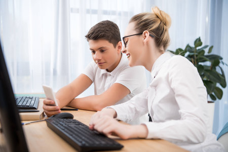 young teenager students looking at smartphone