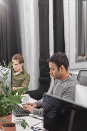 young men working at modern office