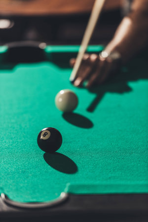 cropped image of man playing in poolの写真素材