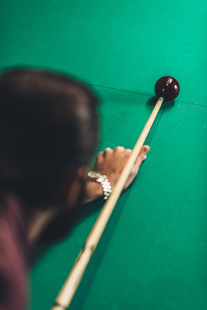 back view of cropped man playing in russian pool