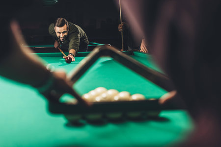 cropped image of men company playing in russian pool