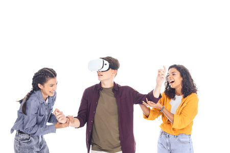 excited teenage students having fun with vr headset isolated on whiteの写真素材