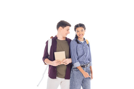 portrait of smiling students with backpacks isolated on whiteの写真素材