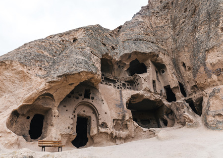low angle view of majestic caves in limestone at famous cappadocia, turkeyの写真素材