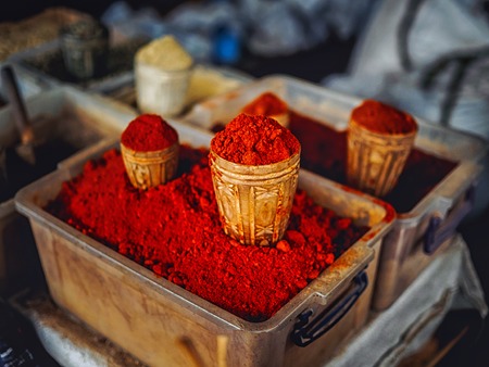 close-up shot of homemade red spice selling on armenian marketの写真素材