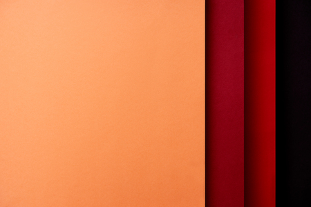 Abstract background with paper sheets in red and orange tones