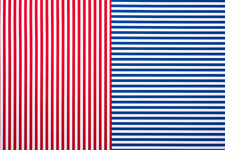 top view of blue and red surface with white stripes for background