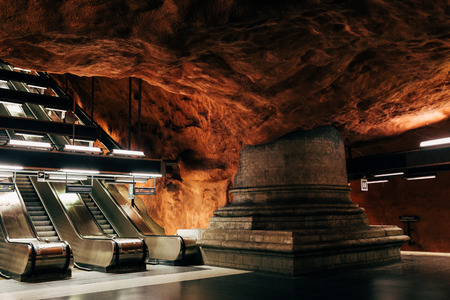 SWEDEN, STOCKHOLM - APRL 27, 2018: escalators at modern designed Radhuset metro station in Stockholm, Swedenのeditorial素材