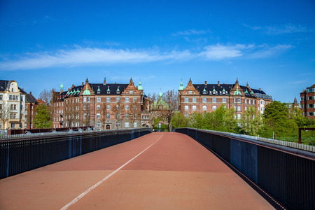 empty bridge and beautiful cityscape with historical buildings in copenhagen, denmark