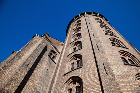 low angle view of majestic historical castle against blue sky, copenhagen, denmarkのeditorial素材