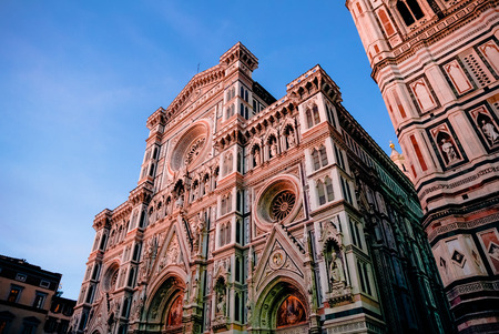 low angle view of Duomo Cathedral with Giotto Bell Tower Facade in Florence, Italyの写真素材
