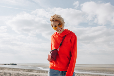beautiful smiling girl on beach, Saint michaels mount, Franceの写真素材