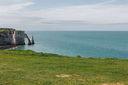calm view of beautiful cliff and blue sea, Etretat, Normandy, Franceの写真素材