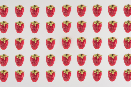 Rows of strawberry isolated on white background