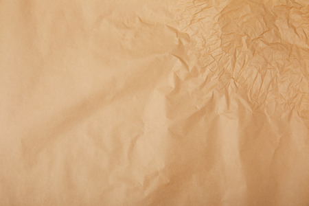 full frame shot of crumpled kraft paper for backgroundの写真素材