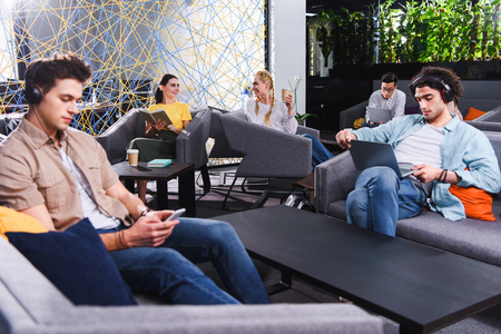 group of multicultural businesspeople working at modern coworking officeの写真素材