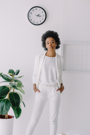 beautiful african american businesswoman posing in officeの写真素材