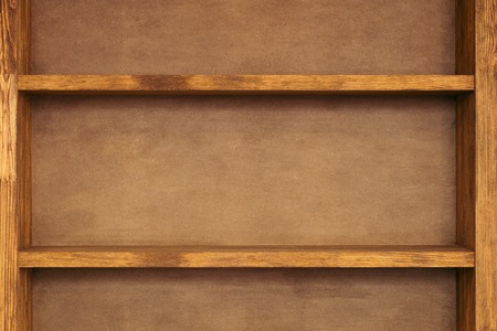 close-up view of empty wooden shelves backgroundの写真素材