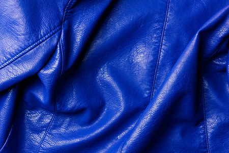 top view of dark blue leather shiny textile as backgroundの写真素材