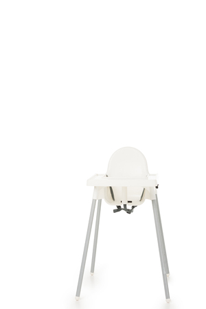 vertical shot of highchair isolated on white backgroundの写真素材