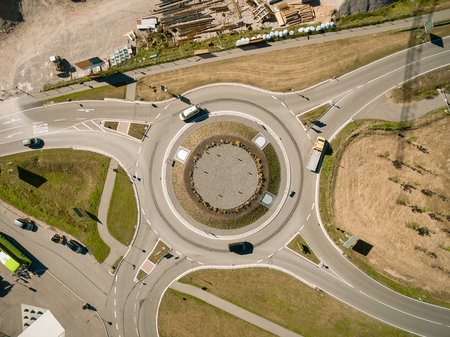 aerial view of various cars riding by roundabout, Kyiv, Ukraineの写真素材