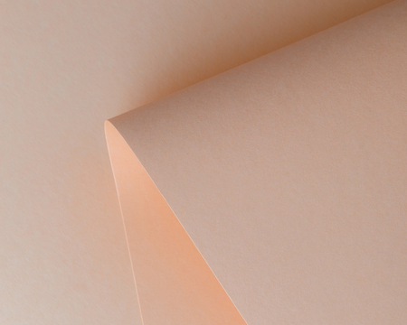 close-up view of beautiful tender beige paper sheet